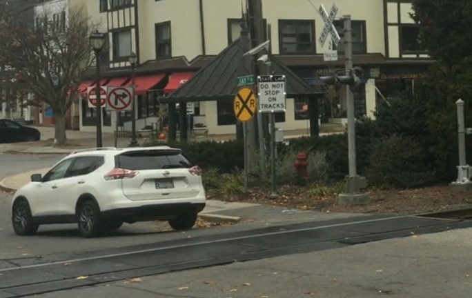 Figure 4. Example of LED-enhanced DO NOT STOP ON TRACKS sign (NYR9-5) at a grade crossing in Katonah, NY Image Credit: Volpe Center
