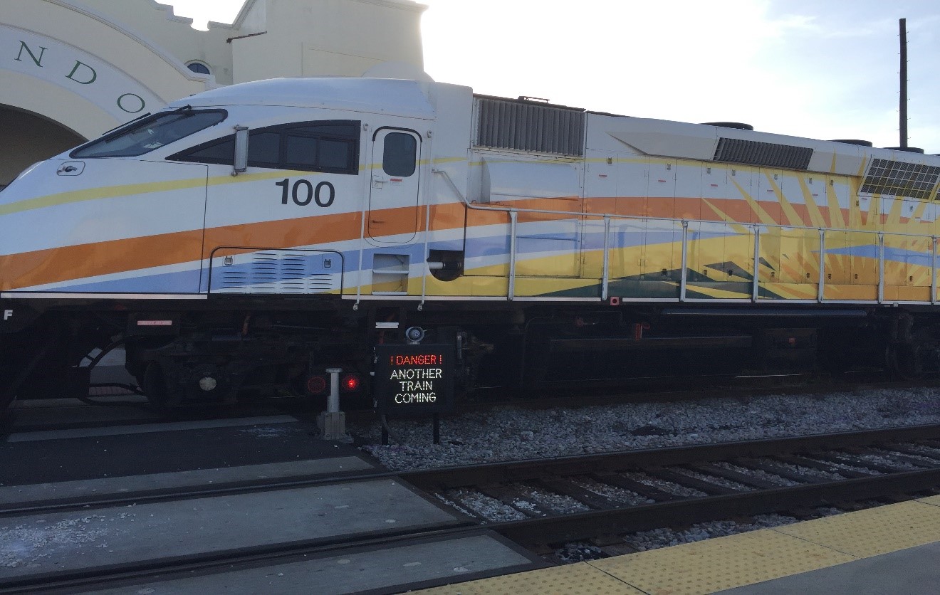 Figure 4. Example of a second train warning system at a station crossing in Orlando, FL Image Credit: Volpe Center