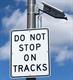 Figure 3. Example of LED-enhanced DO NOT STOP ON TRACKS sign (R8-8) at a grade crossing in Belmont, MA Image Credit: Volpe Center
